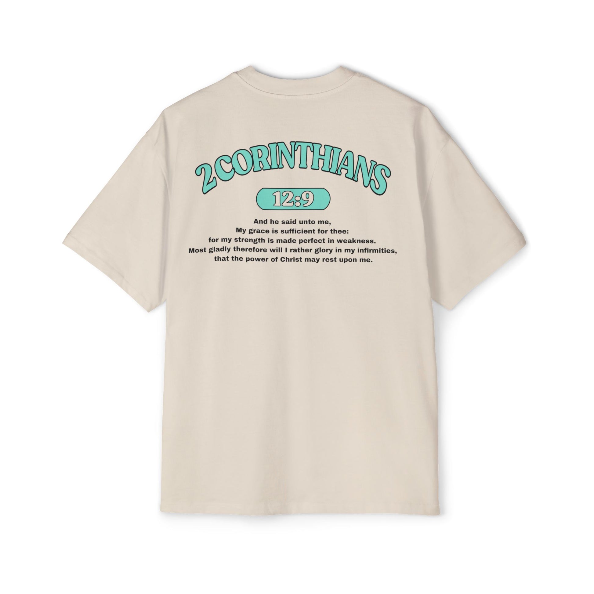 Back of Surrendered Apparel cream oversized Christian T-shirt featuring the Bible verse 2 Corinthians 12:9 in bold teal and black text, providing a cozy fit perfect for cooler days and sharing faith.