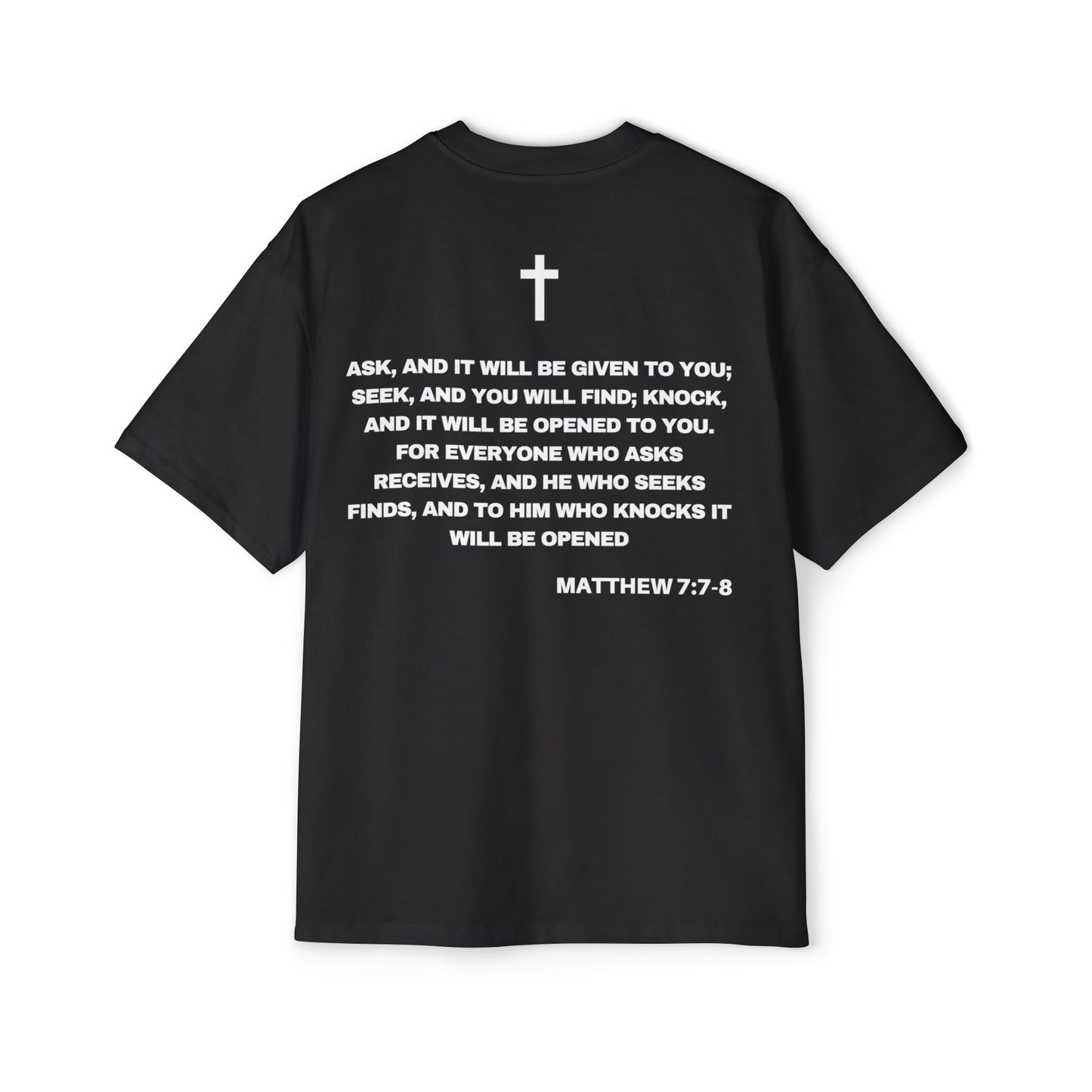 Back of Surrendered Apparel black oversized Christian T-shirt featuring the Bible verse Matthew 7:7-8 in bold text, providing a cozy fit perfect for cooler days and sharing faith.