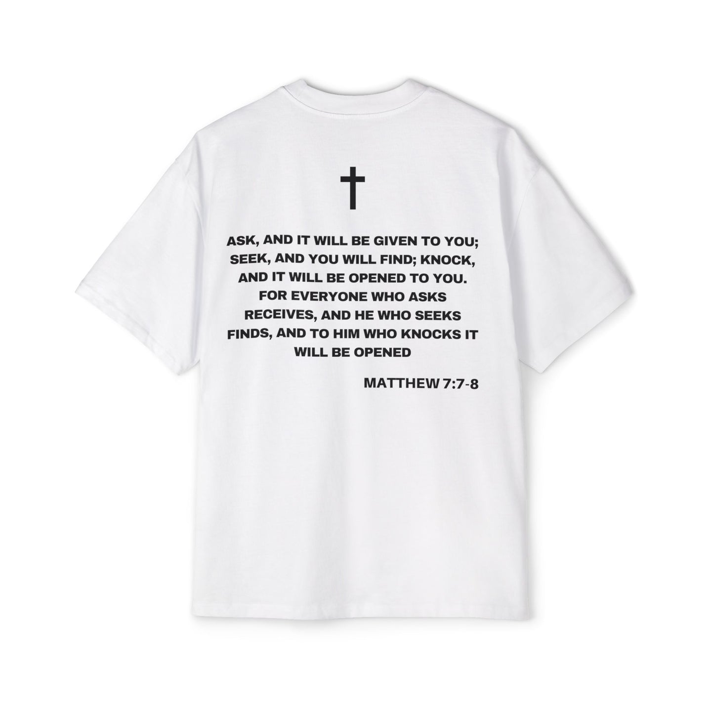 Back of Surrendered Apparel white oversized Christian T-shirt featuring the Bible verse Matthew 7:7-8 in bold text, providing a cozy fit perfect for cooler days and sharing faith.