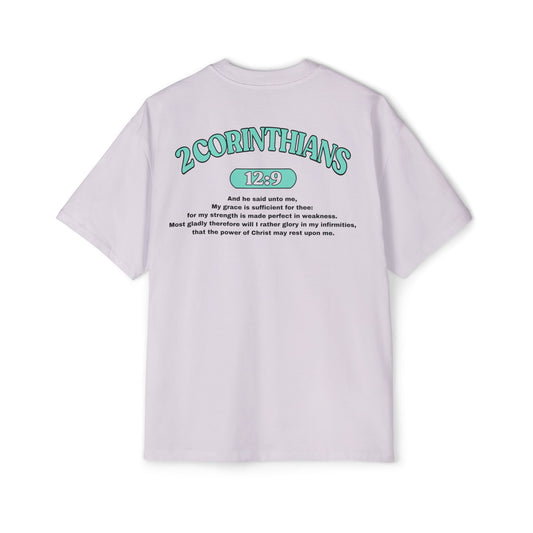 Back of Surrendered Apparel lavender oversized Christian T-shirt featuring the Bible verse 2 Corinthians 12:9 in bold teal and black text, providing a cozy fit perfect for cooler days and sharing faith.