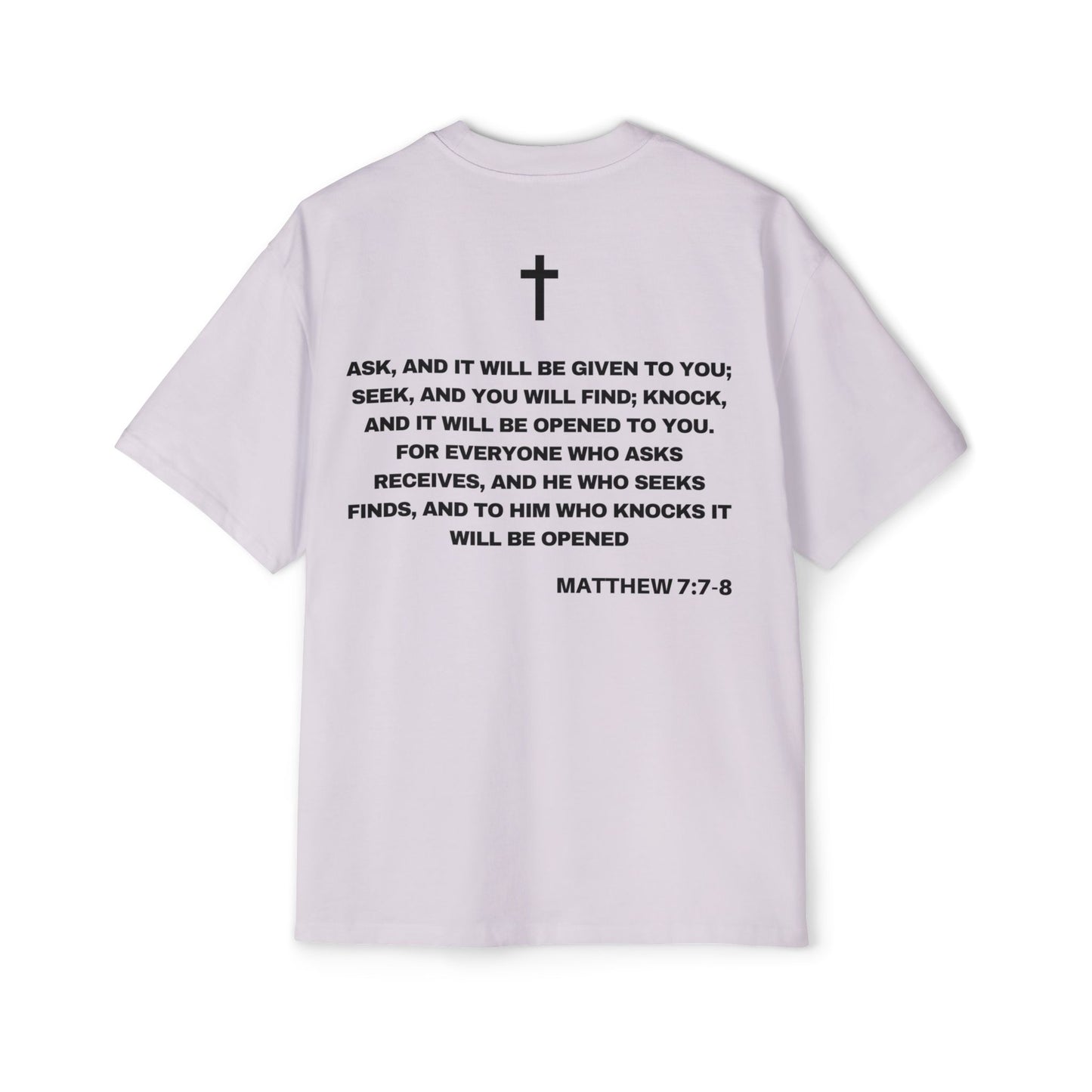 Back of Surrendered Apparel lavender oversized Christian T-shirt featuring the Bible verse Matthew 7:7-8 in bold text, providing a cozy fit perfect for cooler days and sharing faith.