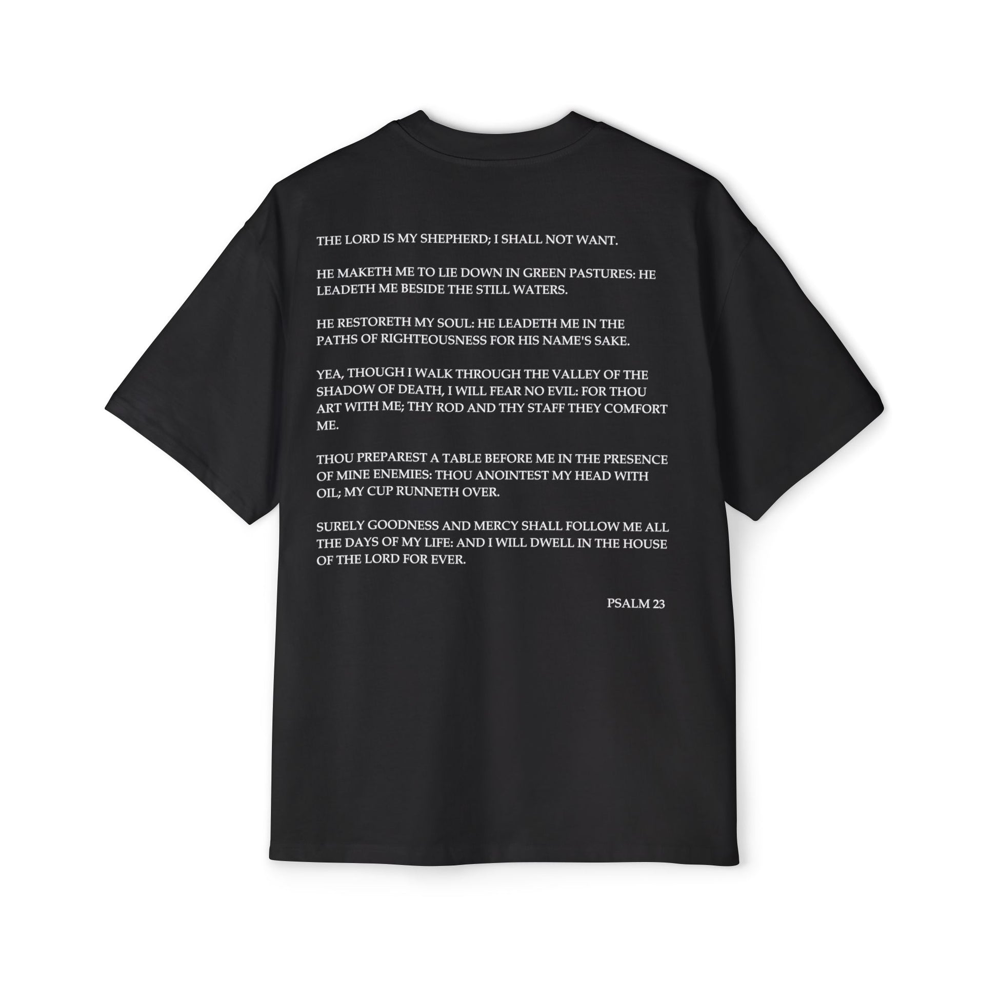 Back of Surrendered Apparel black oversized Christian T-shirt featuring the Bible verse Psalm 23 in bold white text, providing a cozy fit perfect for cooler days and sharing faith.