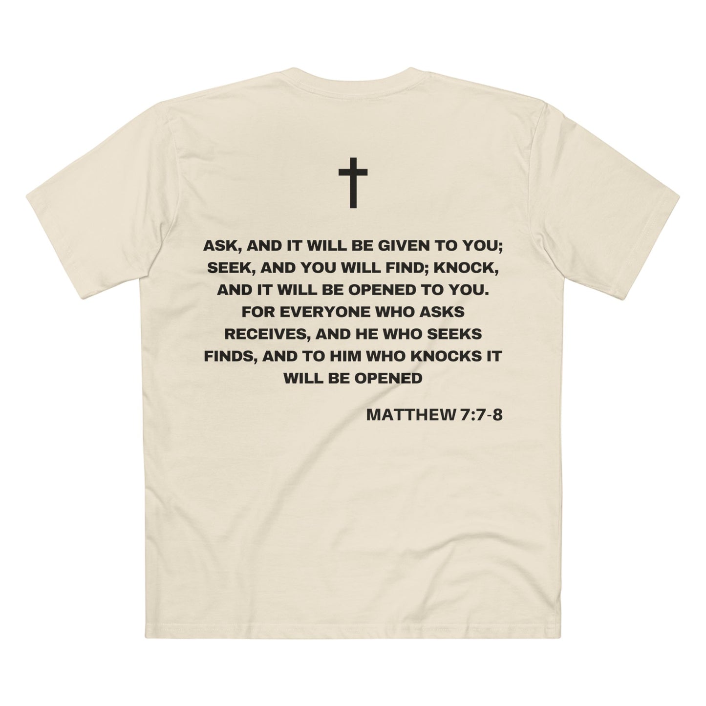 Back of Surrendered Apparel cream Christian T-shirt featuring the Bible verse Matthew 7:7-8 in bold text, cross on top, perfect for sharing faith and Jesus