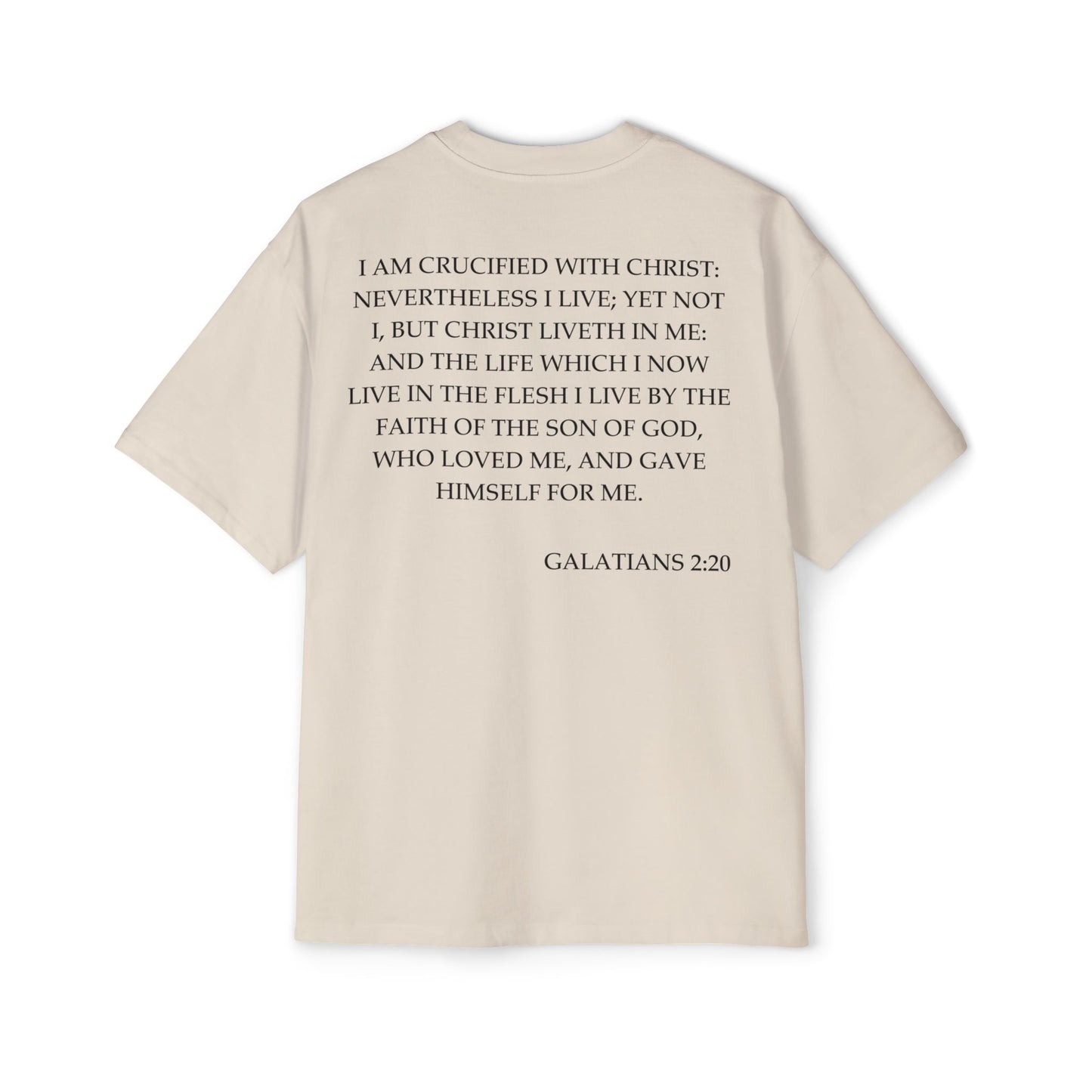 Back of Surrendered Apparel cream oversized Christian T-shirt featuring the Bible verse Galatians 2:20 in bold black text, providing a cozy fit perfect for cooler days and sharing faith