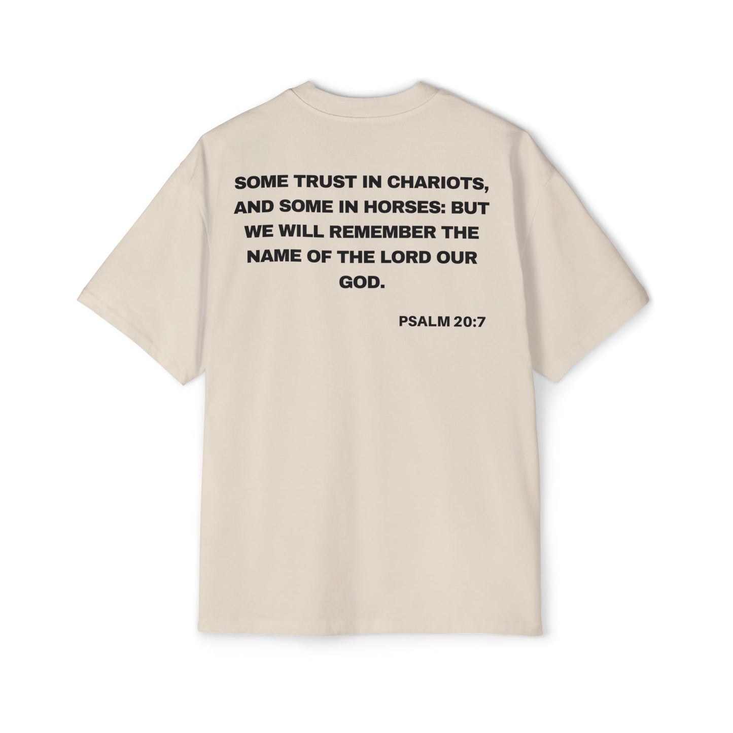 Back of Surrendered Apparel cream oversized Christian T-shirt featuring the Bible verse Psalm 20:7 in bold text, providing a cozy fit perfect for cooler days and sharing faith.