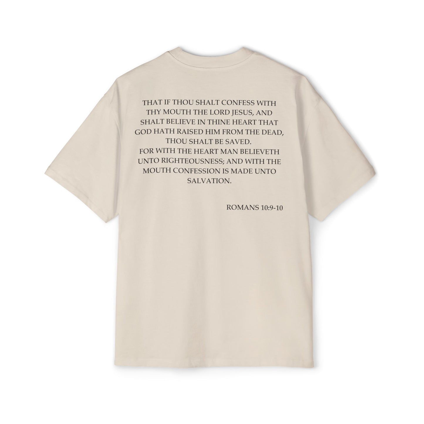 Back of Surrendered Apparel cream oversized Christian T-shirt featuring the Bible verse Romans 10:9-10 in bold black text, providing a cozy fit perfect for cooler days and sharing faith.