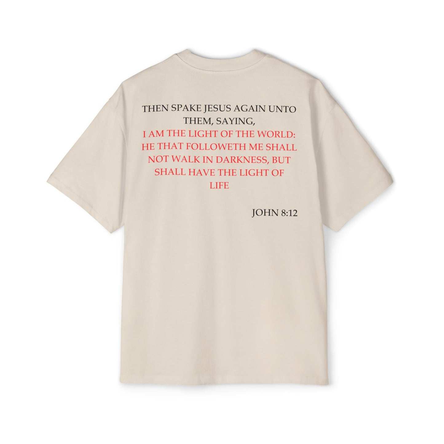 Back of Surrendered Apparel cream oversized Christian T-shirt featuring the Bible verse John 8:12 in bold black and red text, providing a cozy fit perfect for cooler days and sharing faith.