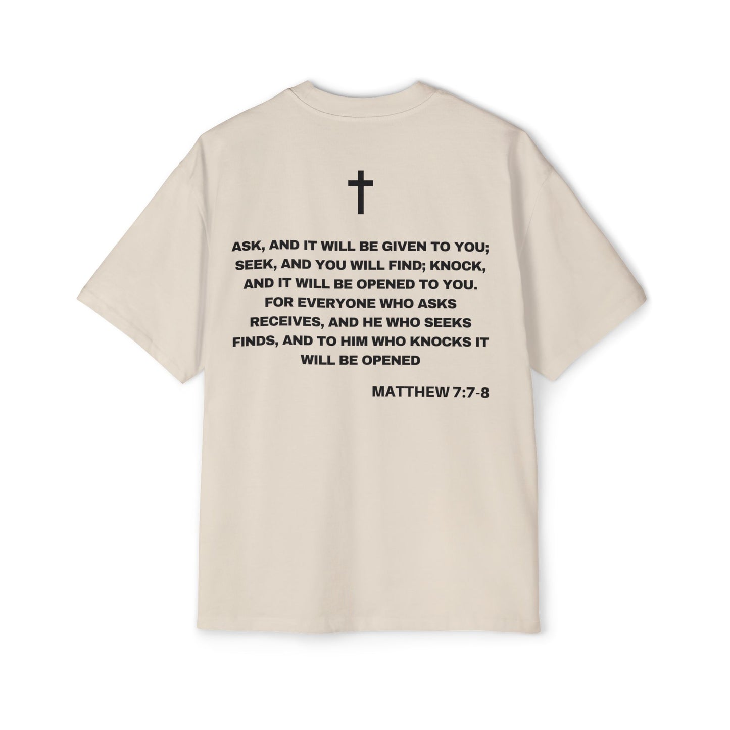 Back of Surrendered Apparel cream oversized Christian T-shirt featuring the Bible verse Matthew 7:7-8 in bold text, providing a cozy fit perfect for cooler days and sharing faith.