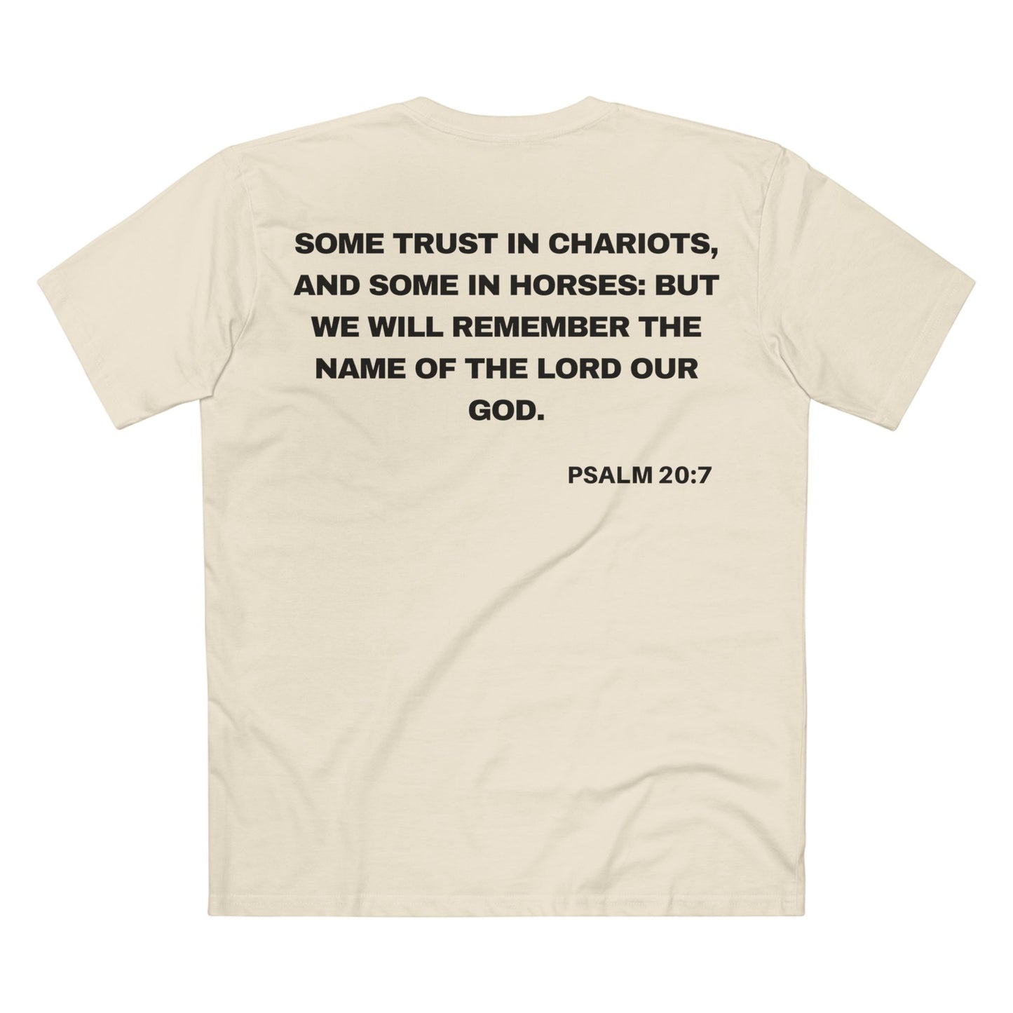 Back of Surrendered Apparel cream Christian T-shirt featuring the Bible verse psalm 20:7 in bold text, perfect for sharing faith and Jesus