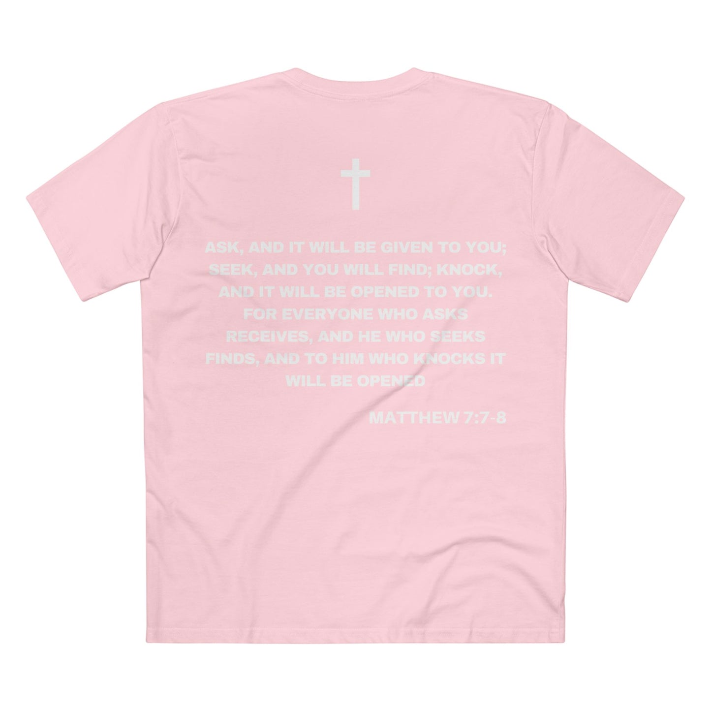 Back of Surrendered Apparel pink Christian T-shirt featuring the Bible verse Matthew 7:7-8 in bold text, cross on top, perfect for sharing faith and Jesus