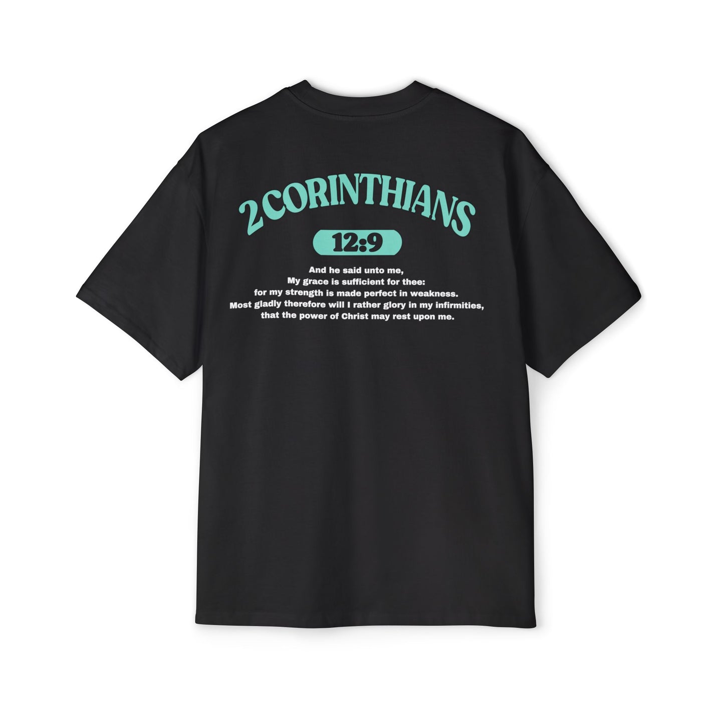 Back of Surrendered Apparel black oversized Christian T-shirt featuring the Bible verse 2 Corinthians 12:9 in bold teal and white text, providing a cozy fit perfect for cooler days and sharing faith.